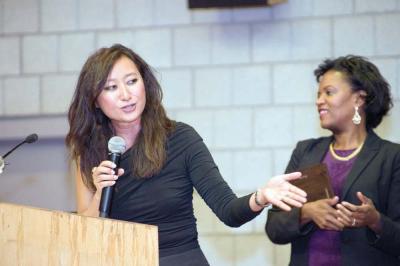 Trinh Nguyen, left, the director at the Mayor’s Office of Workforce Development, accepted an award from VietAID at their annual gala on Oct. 17 as State Senator Linda Dorcena Forry looks on. Photo courtesy VietAID